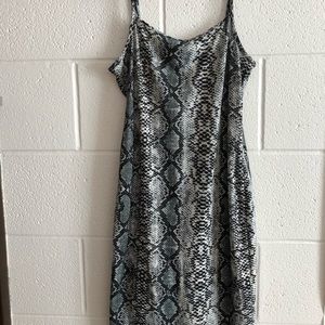 Tight snakeskin mini dress